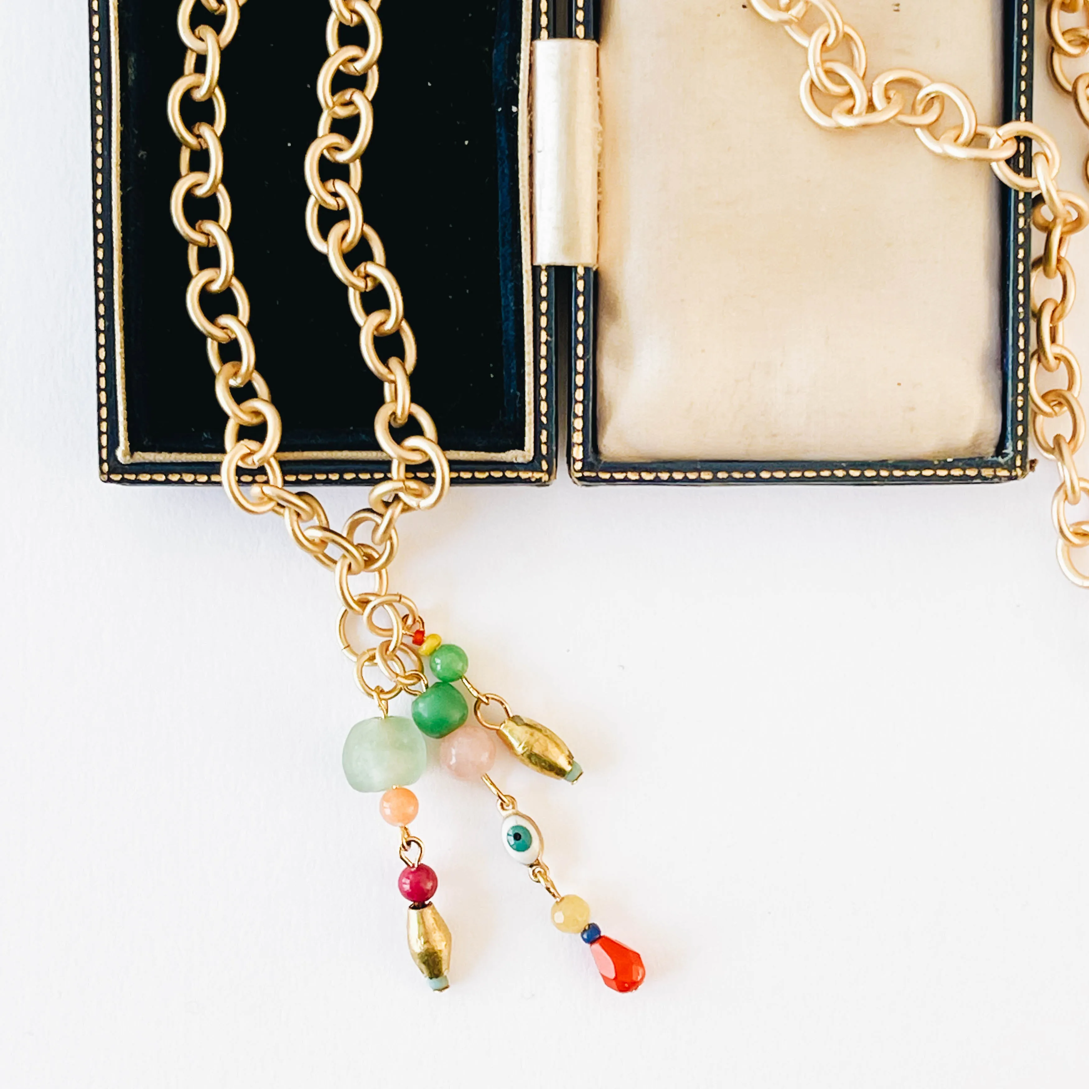 Thick gold beaded drop necklace