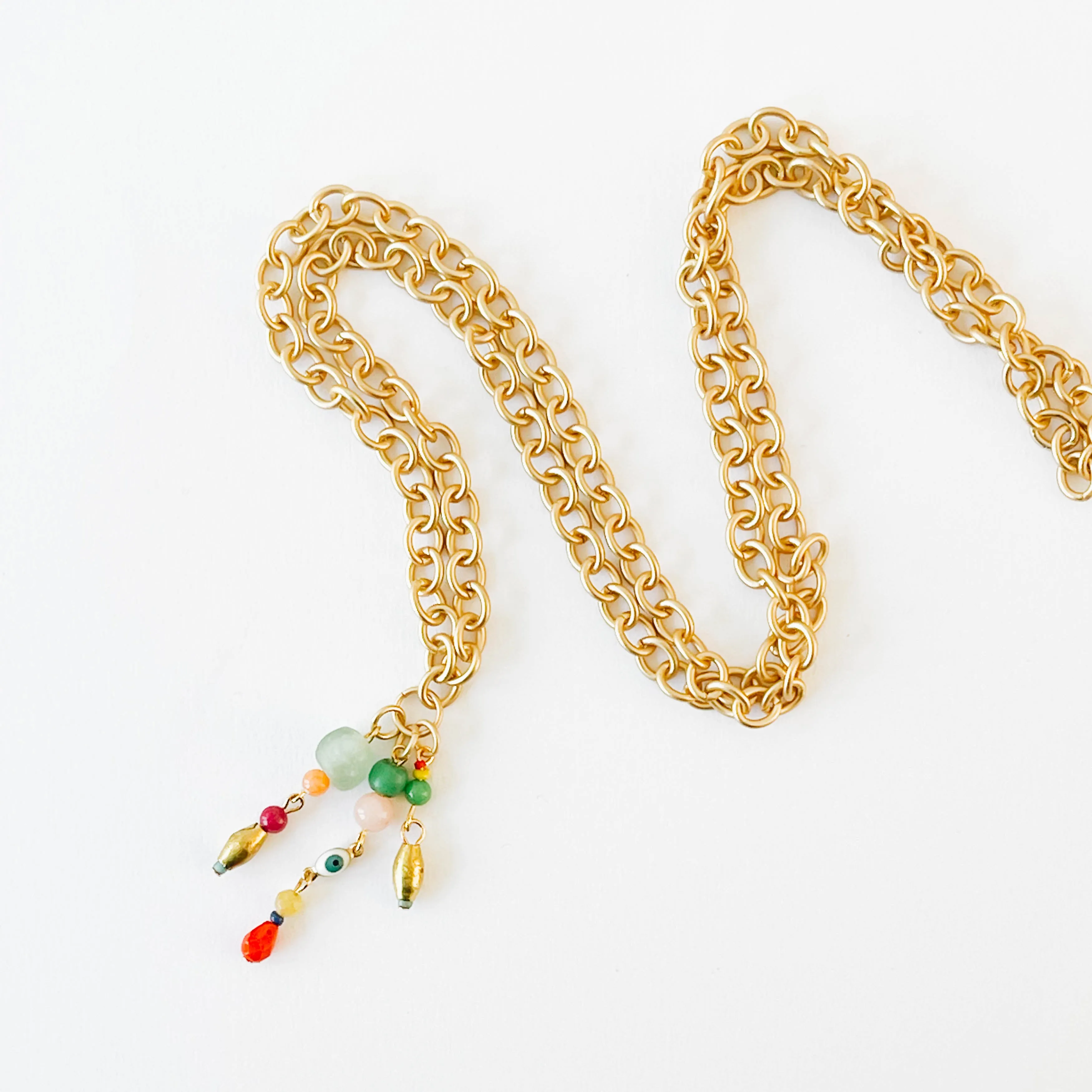 Thick gold beaded drop necklace