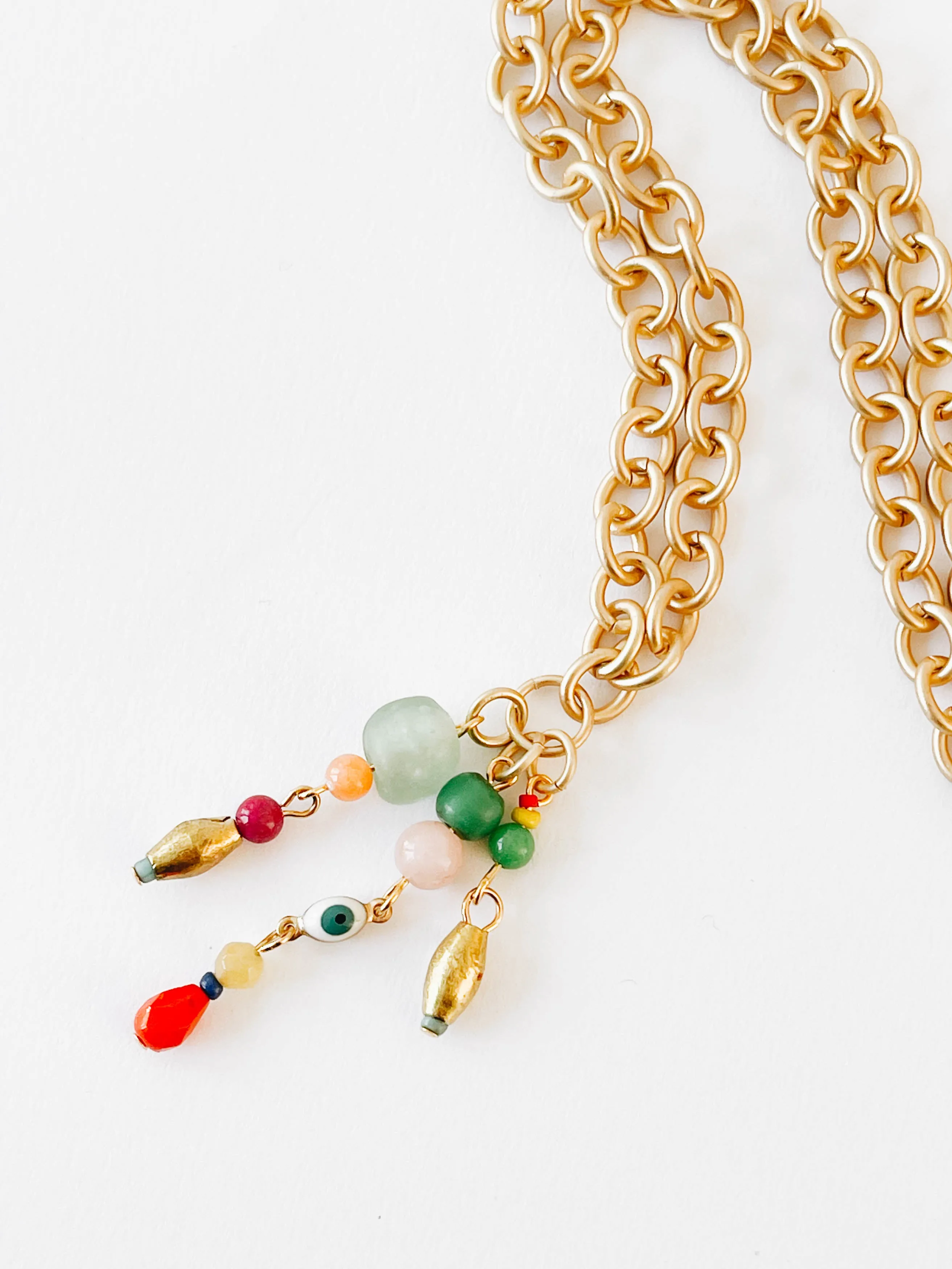 Thick gold beaded drop necklace